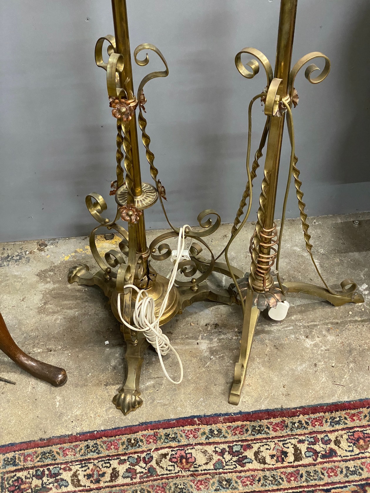 Two Edwardian brass telescopic standard lamps.